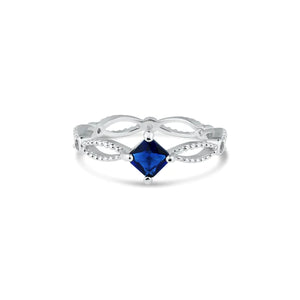 ANILLO DETALLES OVALADOS Y PIEDRA AZUL