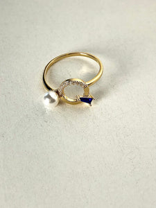 ANILLO CON PERLA Y PIEDRA AZUL